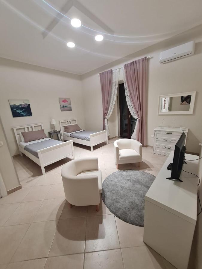 Palizzi's Behind Plebiscite Square Apartment *
