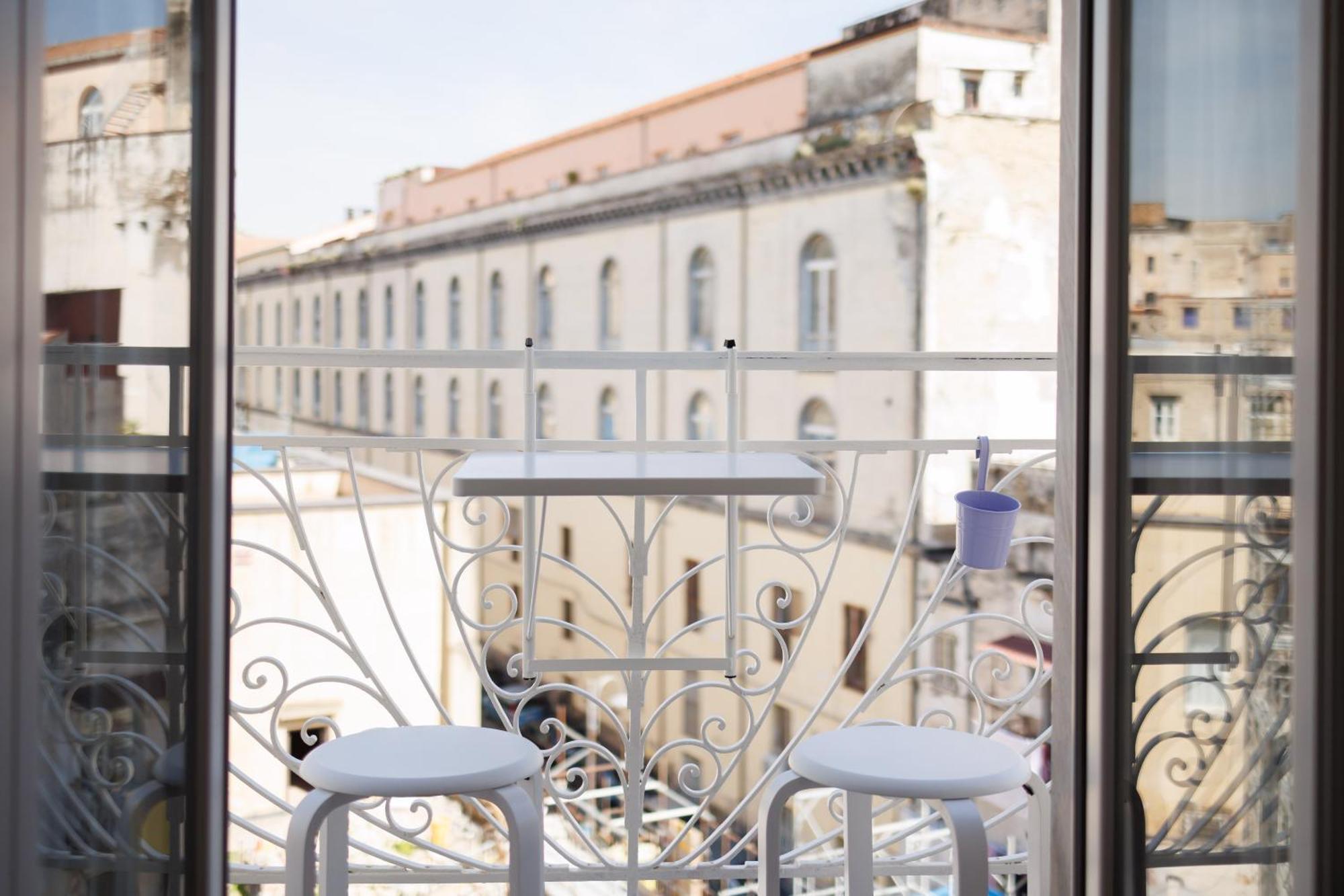 Apartment House In Decumani Yellow By Houseinnaples